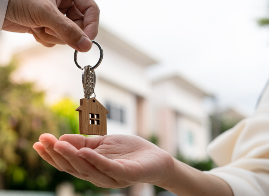 person receiving keys to home