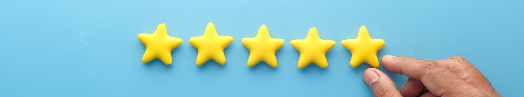 five yellow stars over blue background