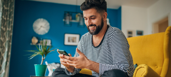 man making payment on cellphone